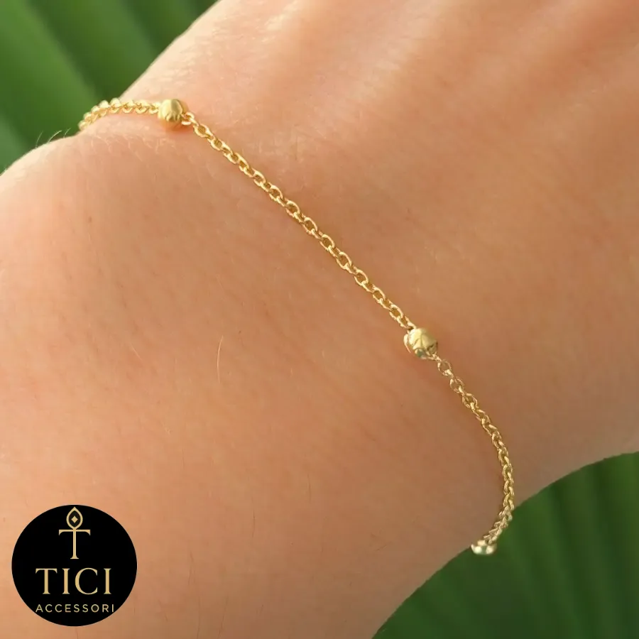 Pulseira Dourada com Esferas de Luz