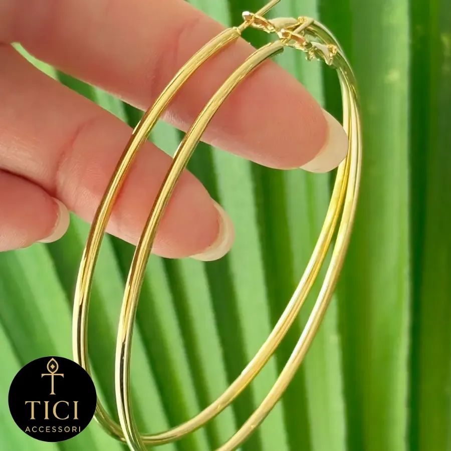 Maxi Argola Dourada Lisa – Essência e Brilho