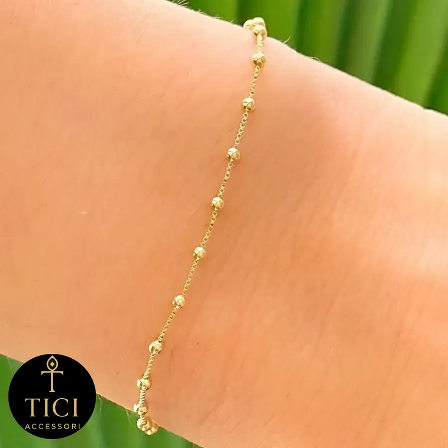 Pulseira Pontos de Luz Dourada