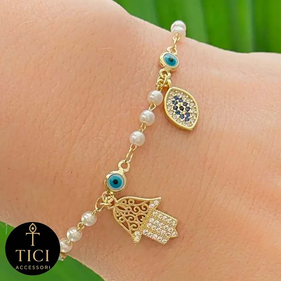Pulseira Pérolas e Proteção: Olho Grego e Hamsa